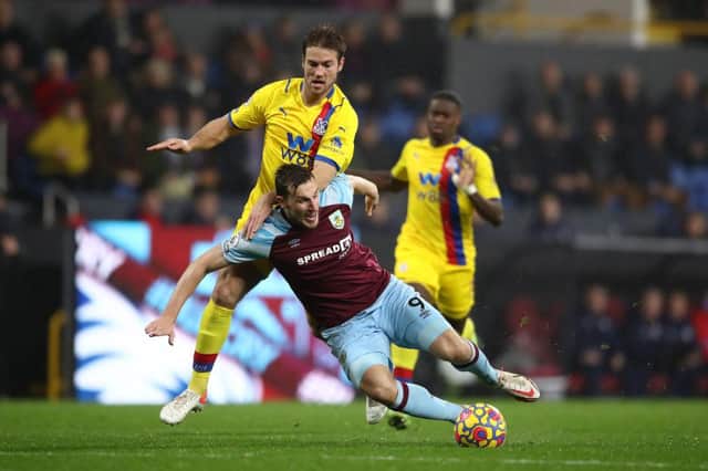 Chris Wood of Burnley is brought down by Joachim Andersen of Crystal Palace. (Photo by Jan Kruger/Getty Images)