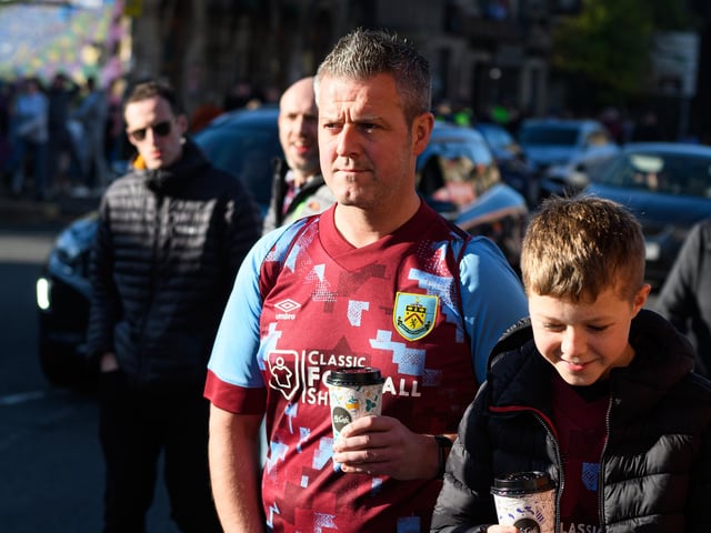Burnley fans arrive at Turf Moor ahead of the Championship fixture with Blackburn Rovers which ended in a 3-0 victory for the Clarets. Photo: Kelvin Stuttard