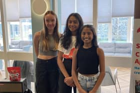 Saanvi Reddy (centre) with her friend Eloise Czapowski and younger sister Anvitha, who collected donations from Saanvi’s appreciative audience after her violin recital  in aid of Lancashire Teaching Hospitals charity’s Children’s Appeal