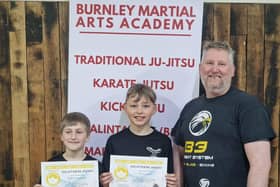 Left: William Newhouse, age 12, Middle: Lucas Green age 10, Right: Sensei Steven Baker