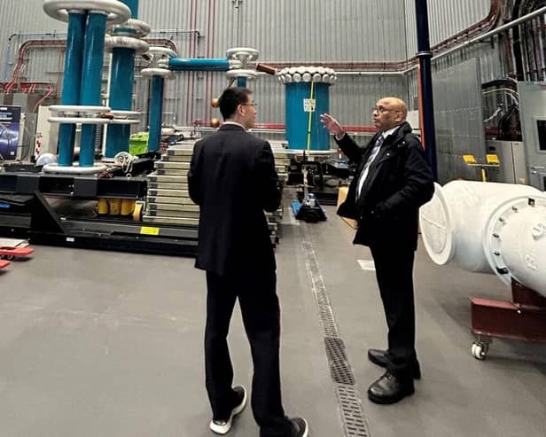 Sir Mark Hendrick MP (right) with Professor Qiang Liu in The University of Manchester’s High Volt.