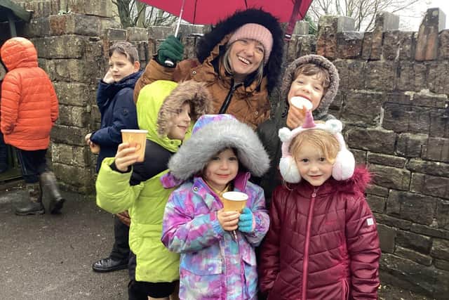 Mrs Rosie and children enjoy hot chocolcate at the opening ceremony
