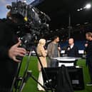 Manchester United's Dutch manager Erik ten Hag (2R) gives an interview to TNT Sports ahead of the English Premier League football match between Burnley and Manchester United at Turf Moor in Burnley, north-west England on September 23, 2023. (Photo by Paul ELLIS / AFP) / RESTRICTED TO EDITORIAL USE. No use with unauthorized audio, video, data, fixture lists, club/league logos or 'live' services. Online in-match use limited to 120 images. An additional 40 images may be used in extra time. No video emulation. Social media in-match use limited to 120 images. An additional 40 images may be used in extra time. No use in betting publications, games or single club/league/player publications. /  (Photo by PAUL ELLIS/AFP via Getty Images)