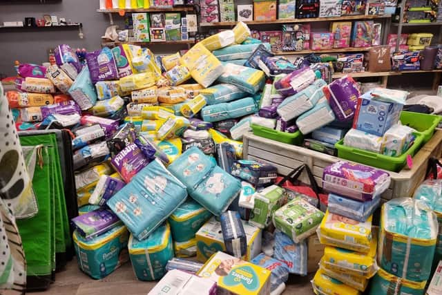 A bumper collection of baby products and sanitary items, worth almost £4,000, have been delivered to community group DEPHER to help struggling families in Burnley.
