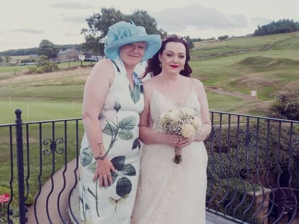 Shel Baldwin with her daughter Mica Fifield on her wedding day.