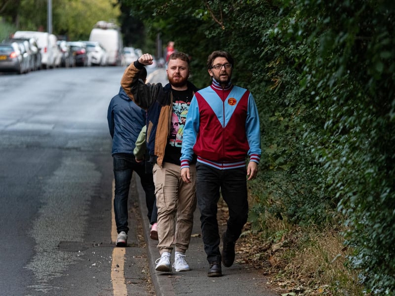 Burnley fans arrive at the Peninsula Stadium for the Carabao Cup tie with Salford City. Photo: Kelvin Lister-Stuttard
