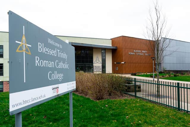 An investigation is underway at Burnley's Blessed Trinity RC College after a video, showing a teacher appearing to shout at a male student, calling him a 'scumbag,' and ordering him to leave the classroom, was shared on social media.