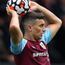 BURNLEY, ENGLAND - OCTOBER 02:   Matthew Lowton of Burnley takes a throw in during the Premier League match between Burnley and Norwich City at Turf Moor on October 02, 2021 in Burnley, England. (Photo by Alex Livesey/Getty Images)