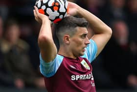 BURNLEY, ENGLAND - OCTOBER 02:   Matthew Lowton of Burnley takes a throw in during the Premier League match between Burnley and Norwich City at Turf Moor on October 02, 2021 in Burnley, England. (Photo by Alex Livesey/Getty Images)