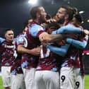 BURNLEY, ENGLAND - DECEMBER 17: Manuel Benson of Burnley celebrates with teammates after scoring their side's second goal during the Sky Bet Championship between Burnley and Middlesbrough at Turf Moor on December 17, 2022 in Burnley, England. (Photo by Cameron Smith/Getty Images)