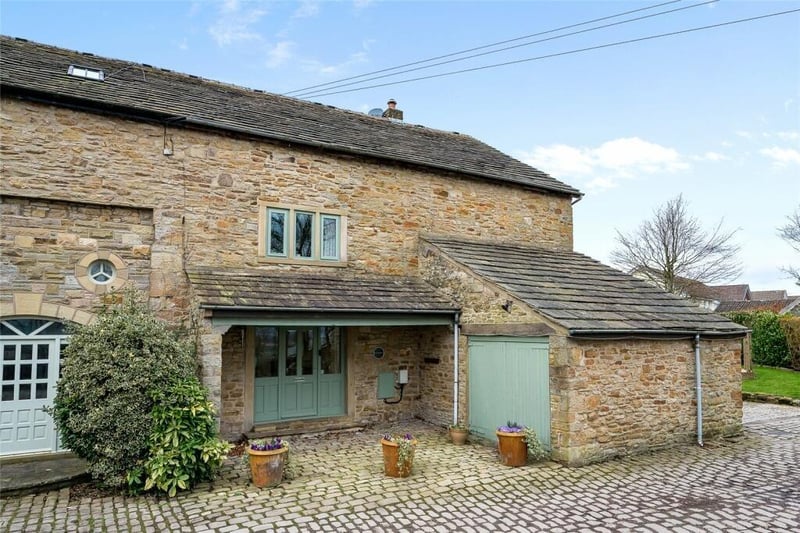 Price: £525,000
Agent: Fine and Country

A superb contemporary semi-detached barn conversion offering immaculate 3/4 bedroom family accommodation, which is located in a quiet yet convenient location with excellent access to local amenities.