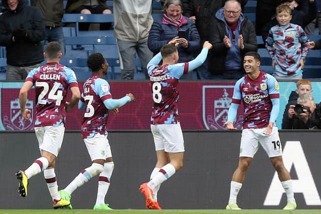 Burnley's  Anass Zaroury (right) celebrates scoring his side's third goal with team-mates

The EFL Sky Bet Championship - Burnley v Swansea City - Saturday 15th October 2022 - Turf Moor - Burnley