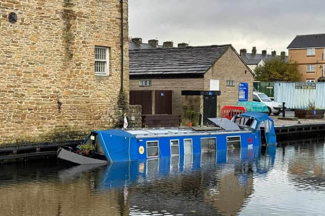 A barge has sunk in a stretch of the Leeds and Liverpool Canal next to Rosegrove Lane bridge in Burnley.