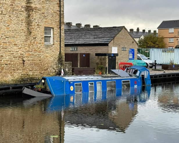 A barge has sunk in a stretch of the Leeds and Liverpool Canal next to Rosegrove Lane bridge in Burnley.