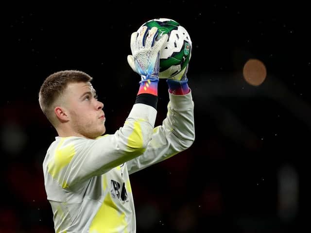 MANCHESTER, ENGLAND - DECEMBER 21: Bailey Peacock-Farrell of Burnley warms up prior to the Carabao Cup Fourth Round match between Manchester United and Burnley at Old Trafford on December 21, 2022 in Manchester, England. (Photo by Lewis Storey/Getty Images)
