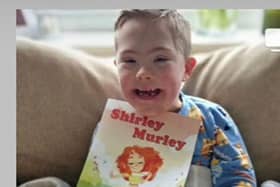 Connor with his Burnley-based book Shirley Murley