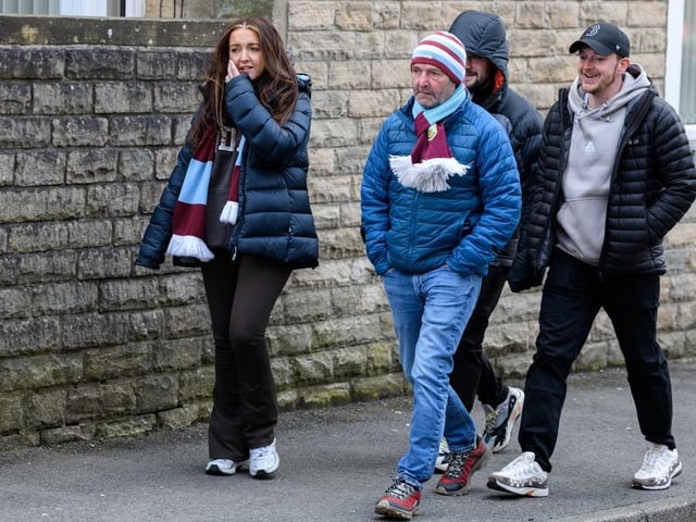 Burnley fans arrive at Turf Moor for the Premier League fixture against Brighton and Hove Albion. Photo: Kelvin Lister-Stuttard