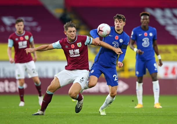 Chelsea's German midfielder Kai Havertz (CR) battles with Burnley's English defender James Tarkowski (CL) during the English Premier League football match between Burnley and Chelsea at Turf Moor in Burnley, north west England on October 31, 2020. (Photo by ALEX LIVESEY/POOL/AFP via Getty Images)