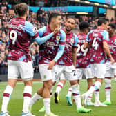 Burnley's Jay Rodriguez (left) celebrates scoring his side's second goal with team-mate Anass Zaroury

The EFL Sky Bet Championship - Burnley v Swansea City - Saturday 15th October 2022 - Turf Moor - Burnley