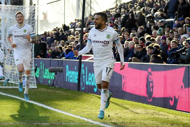 LONDON, ENGLAND - FEBRUARY 26: Aaron Lennon of Burnley celebrates after their side's first goal, an own goal scored by Luka Milivojevic (Not pictured) of Crystal Palace the Premier League match between Crystal Palace and Burnley at Selhurst Park on February 26, 2022 in London, England. (Photo by Tom Dulat/Getty Images)