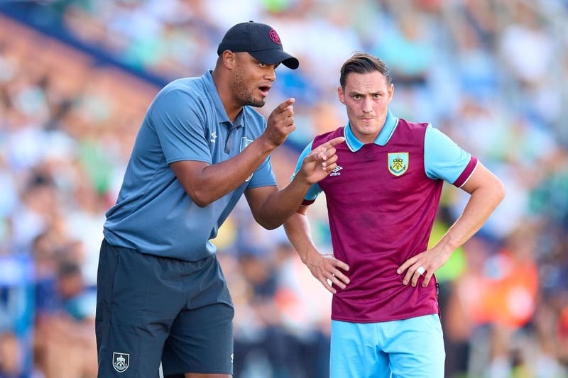 HUELVA, SPAIN - JULY 28: Vincent Kompany, manager of Burnley speaks with Connor Roberts of Burnley FC during a Pre Season Friendly Match between Real Betis and Burnley FC at Estadio Nuevo Colombino on July 28, 2023 in Huelva, Spain. (Photo by Fran Santiago/Getty Images)