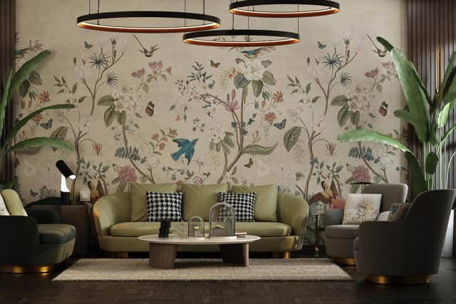 The wallpaper creates a stunning backdrop in this well balanced room.