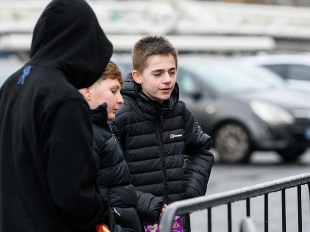 Burnley fans arrive at Turf Moor for the Premier League fixture against West Ham United. Photo: Kelvin Lister-Stuttard