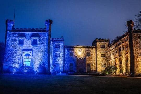 Towneley Hall in blue and yellow to mark the borough's solidarity with the people of Ukraine. Photo: Andy Ford