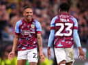 BURNLEY, ENGLAND - AUGUST 30: Vitinho of Burnley celebrates with teammate Nathan Tella after scoring their team's first goal during the Sky Bet Championship between Burnley and Millwall at Turf Moor on August 30, 2022 in Burnley, England. (Photo by Alex Livesey/Getty Images)