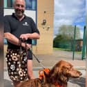Mark Slater of Burnley-based Beloved Pets with Bertie the red setter following his rescue from the Leeds Liverpool Canal