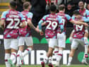Burnley's Nathan Tella (right) celebrates scoring the opening goal with team-mates

The EFL Sky Bet Championship - Burnley v Wigan Athletic - Saturday 11th March 2023 - Turf Moor - Burnley