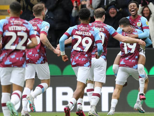 Burnley's Nathan Tella (right) celebrates scoring the opening goal with team-mates

The EFL Sky Bet Championship - Burnley v Wigan Athletic - Saturday 11th March 2023 - Turf Moor - Burnley