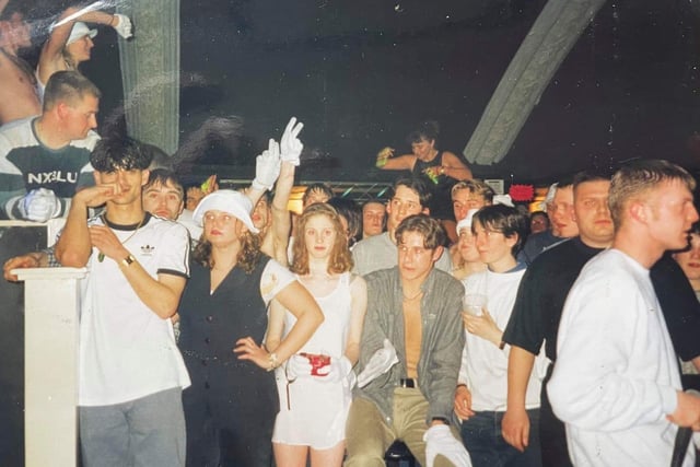 More white gloves and glow sticks. Horns and whistles were a thing too - they became symbolic of the Rave Scene