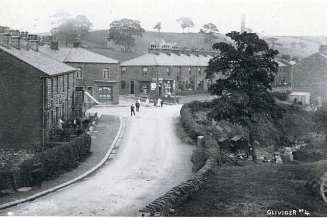 This postcard view is simply named as “Cliviger” but the image is actually of another of the township’s villages, that of Walk Mill. Walk Mill gets its name from a process carried out in the wool industry, fulling, the cleaning of the woven cloth after it has been woven. The mill was to the right of the image. In the background, right of the middle of the image, you might be able to see a tall chimney. This was connected with another of Cliviger’s industries, that of coal mining.