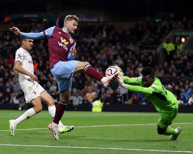 BURNLEY, ENGLAND - SEPTEMBER 23: Jacob Bruun Larsen of Burnley has a shot saved by Andre Onana of Manchester United during the Premier League match between Burnley FC and Manchester United at Turf Moor on September 23, 2023 in Burnley, England. (Photo by Lewis Storey/Getty Images)