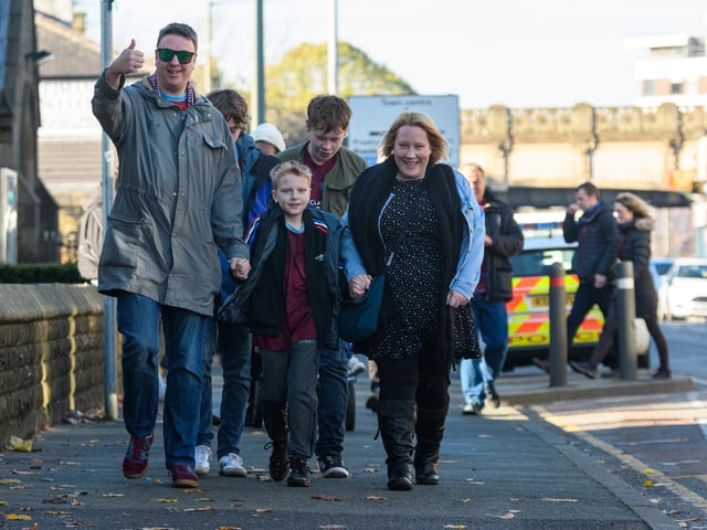 Burnley fans arrive at Turf Moor ahead of the Championship fixture with Blackburn Rovers which ended in a 3-0 victory for the Clarets. Photo: Kelvin Stuttard