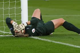 HELSINKI, FINLAND - SEPTEMBER 10:  Rachel Brown of England lies on the floor dejected after conceding a goal from Birgit Prinz of Germany during the UEFA Women's Euro 2009 Final match between England and Germany at the Helsinki Olympic Stadium on September 10, 2009 in Helsinki, Finland.  (Photo by Ian Walton/Getty Images)