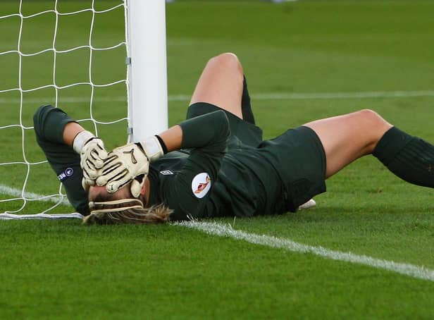 HELSINKI, FINLAND - SEPTEMBER 10:  Rachel Brown of England lies on the floor dejected after conceding a goal from Birgit Prinz of Germany during the UEFA Women's Euro 2009 Final match between England and Germany at the Helsinki Olympic Stadium on September 10, 2009 in Helsinki, Finland.  (Photo by Ian Walton/Getty Images)