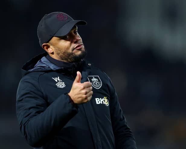SWANSEA, WALES - JANUARY 02: Vincent Kompany, Manager of Burnley, acknowledges the fans following his team's victory in the Sky Bet Championship between Swansea City and Burnley at Liberty Stadium on January 02, 2023 in Swansea, Wales. (Photo by Dan Istitene/Getty Images)