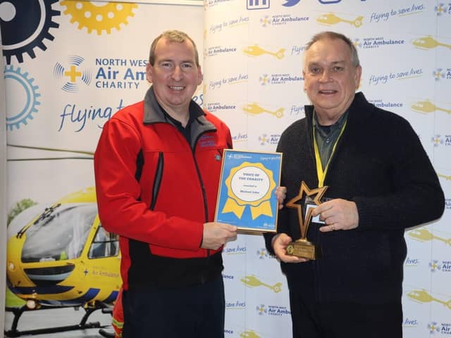 Lancashire volunteer Michael John and paramedic Andy Duncan, of the North West Air Ambulance Charity.