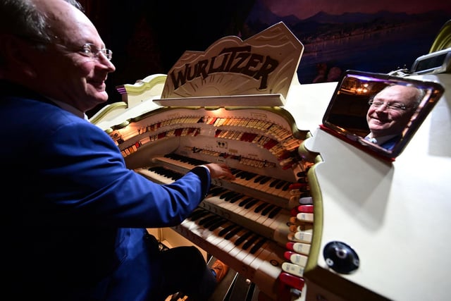 Organist is Phil Kelsall playing the Wurlitzer organ, following a restoration of the ballroom's floor