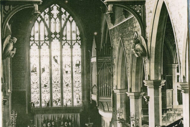 The Chancel at St Peter’s, showing the present site of the organ, right, and the great Master Window, above the altar.