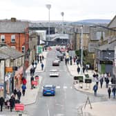 BURNLEY, ENGLAND - MARCH 16: General view as fans make their way to the stadium prior to the Premier League match between Burnley FC and Brentford FC at Turf Moor on March 16, 2024 in Burnley, England. (Photo by Matt McNulty/Getty Images)