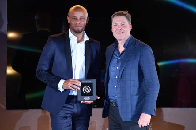 LONDON, ENGLAND - APRIL 21: Vincent Kompany receives his Premier League Hall of Fame medallion from Premier League Chief Executive Richard Masters during the Premier League Hall of Fame 2022 on April 21, 2022 in London, England. (Photo by Tom Dulat/Getty Images for eSC)