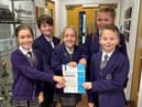 Laneshaw Bridge Primary School pupils with the UNICEF Rights Respecting Bronze Award