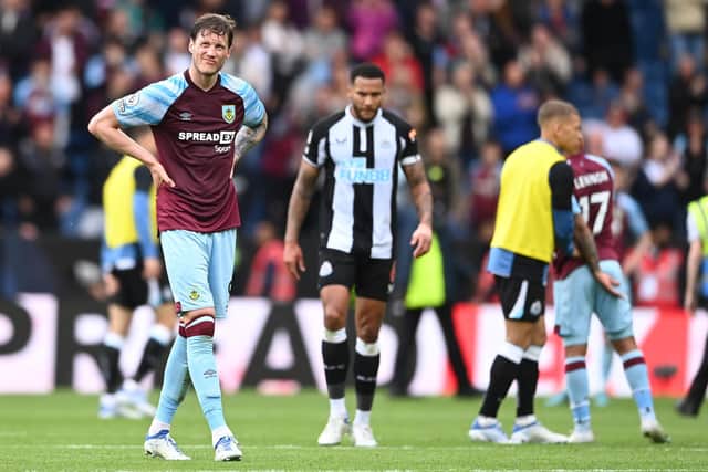 BURNLEY, ENGLAND - MAY 22: Wout Weghorst of Burnley looks dejected following defeat and relegation to the Sky Bet Championship following the Premier League match between Burnley and Newcastle United at Turf Moor on May 22, 2022 in Burnley, England. (Photo by Gareth Copley/Getty Images)