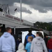 BURNLEY, ENGLAND - MAY 22: A general view outside the stadium as fans arrive prior to the Premier League match between Burnley and Newcastle United at Turf Moor on May 22, 2022 in Burnley, England. (Photo by Gareth Copley/Getty Images)