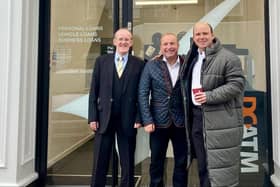 Dave Fishwick (centre) with actor Rory Kinnear (right) and David Henshaw at the Bank of Dave in Burnley