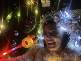 Hayley Bradshaw (right) and Marie Mason dressed in festive costumes, complete with flashing fairy lights, for their daily morning walk to raise money for Pendleside Hospice.