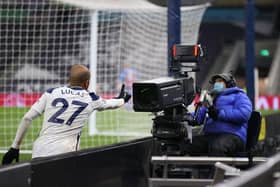 LONDON, ENGLAND - MARCH 07: Lucas Moura of Tottenham Hotspur celebrates his side's victory into a TV Camera after the Premier League match between Tottenham Hotspur and Crystal Palace at Tottenham Hotspur Stadium on March 07, 2021 in London, England. Sporting stadiums around the UK remain under strict restrictions due to the Coronavirus Pandemic as Government social distancing laws prohibit fans inside venues resulting in games being played behind closed doors. (Photo by Julian Finney/Getty Images)